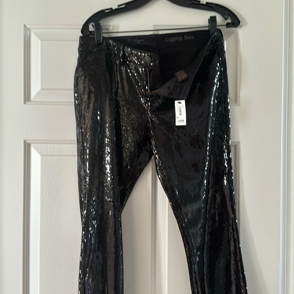 Black sequins leggings size 8 with tag never worn.
